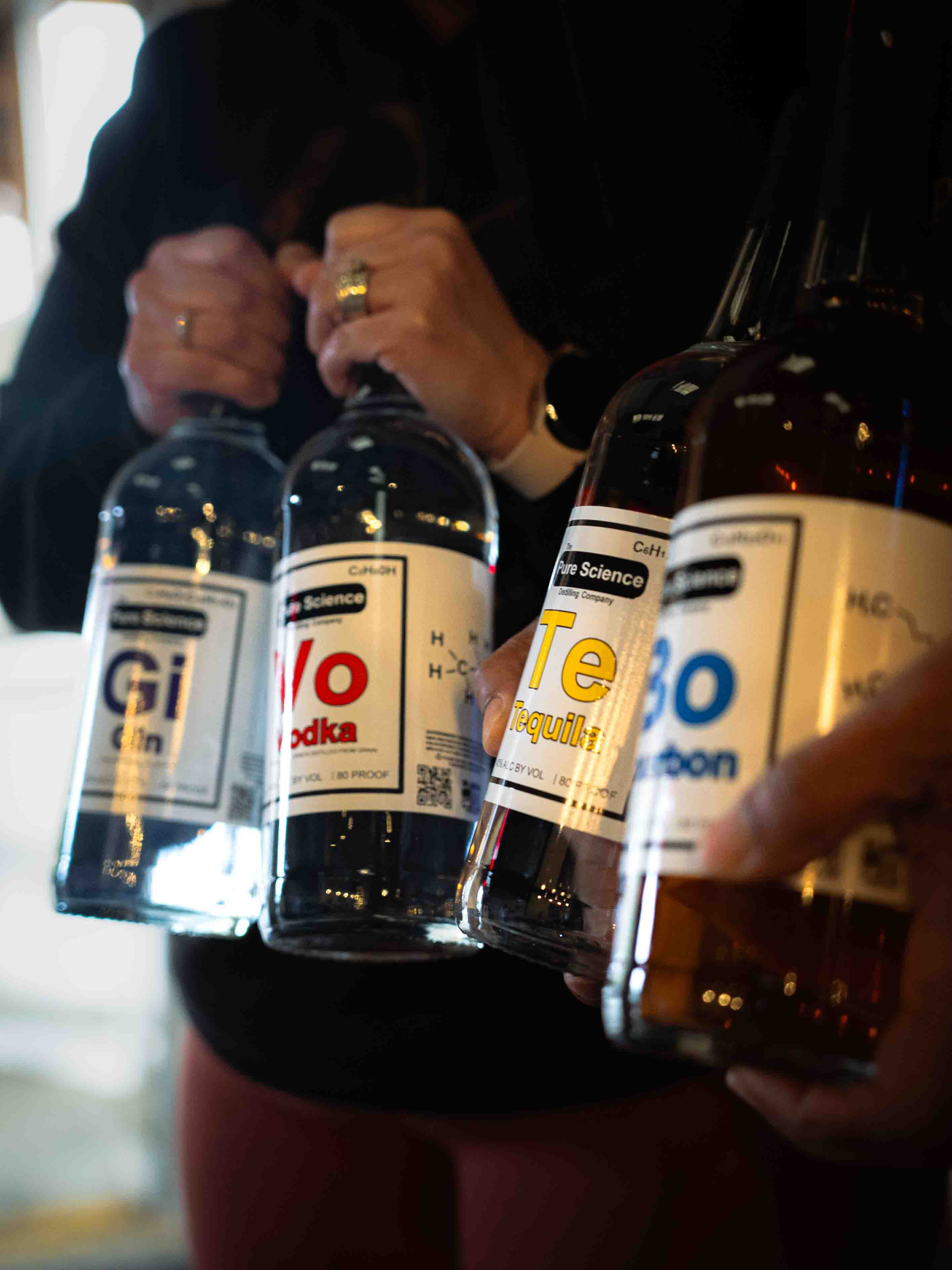 The full Pure Science Distilling Co. set, photographed for the Real Spirits brand launch.